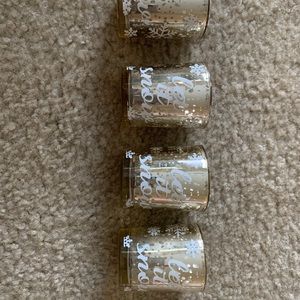 Used 
4 set small candle holder let it snow